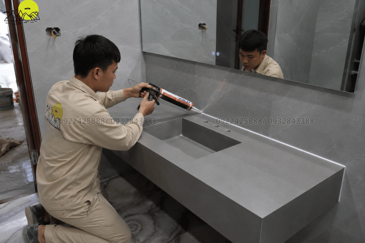 Hệ thống mặt bàn lavabo đá nung kết màu xám vân mây sau khi thi công hoàn chỉnh